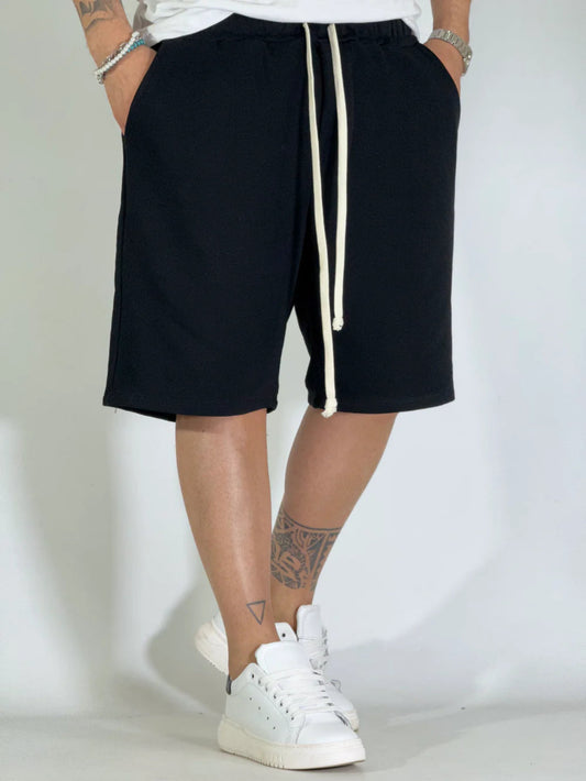 Pantaloncini neri oversize da uomo